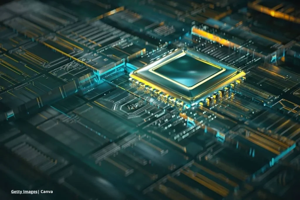 Industria tecnológica y computación cuántica: chip sobre placa de circuito iluminada.