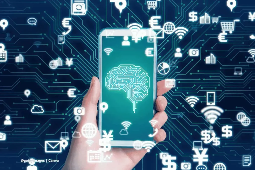 Mano sosteniendo un teléfono con ícono de inteligencia artificial, rodeado de símbolos digitales que representan el impacto de NVIDIA en múltiples industrias.