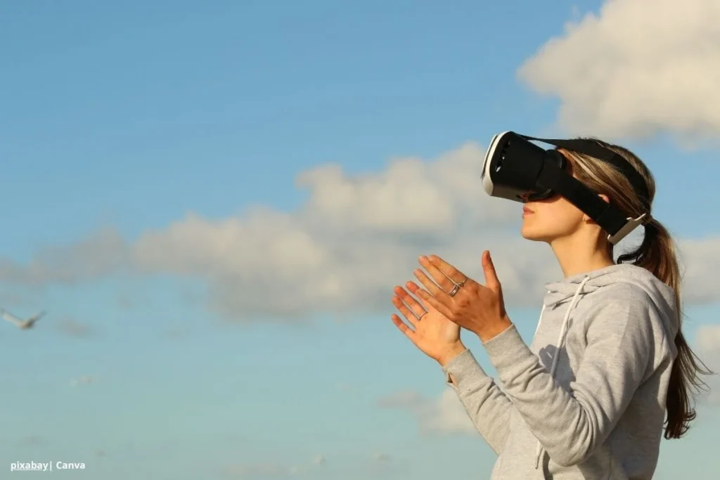 Tecnología y turismo sostenible en Colombia: innovación para un futuro responsable 2 Mujer con gafas de realidad virtual explorando experiencia turística inmersiva en Colombia.